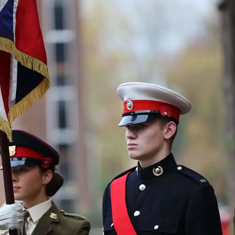 blundells ccf pupils holding british flag in uniform