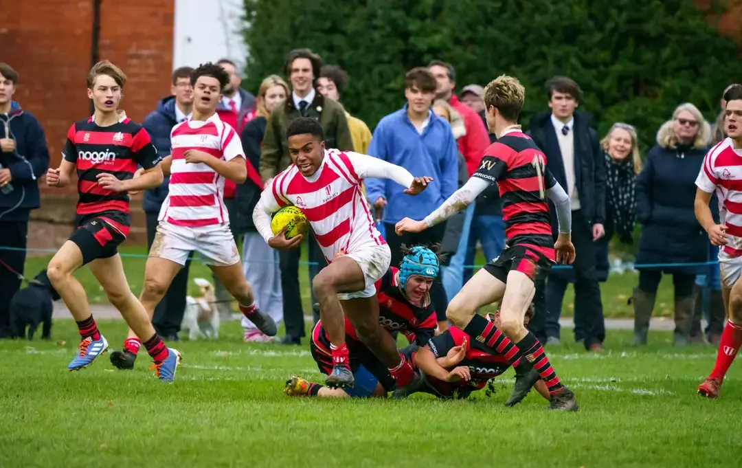 Students playing rugby