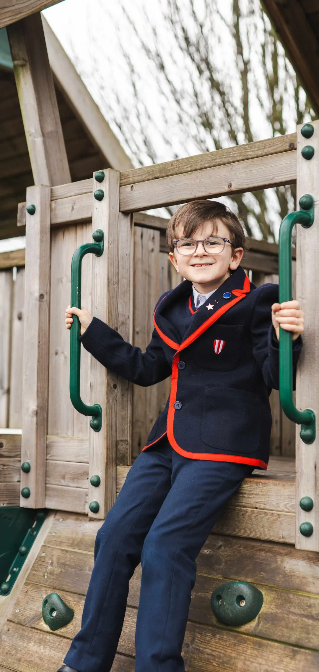 blundels pupil sitting on climbing frame pre prep school devon
