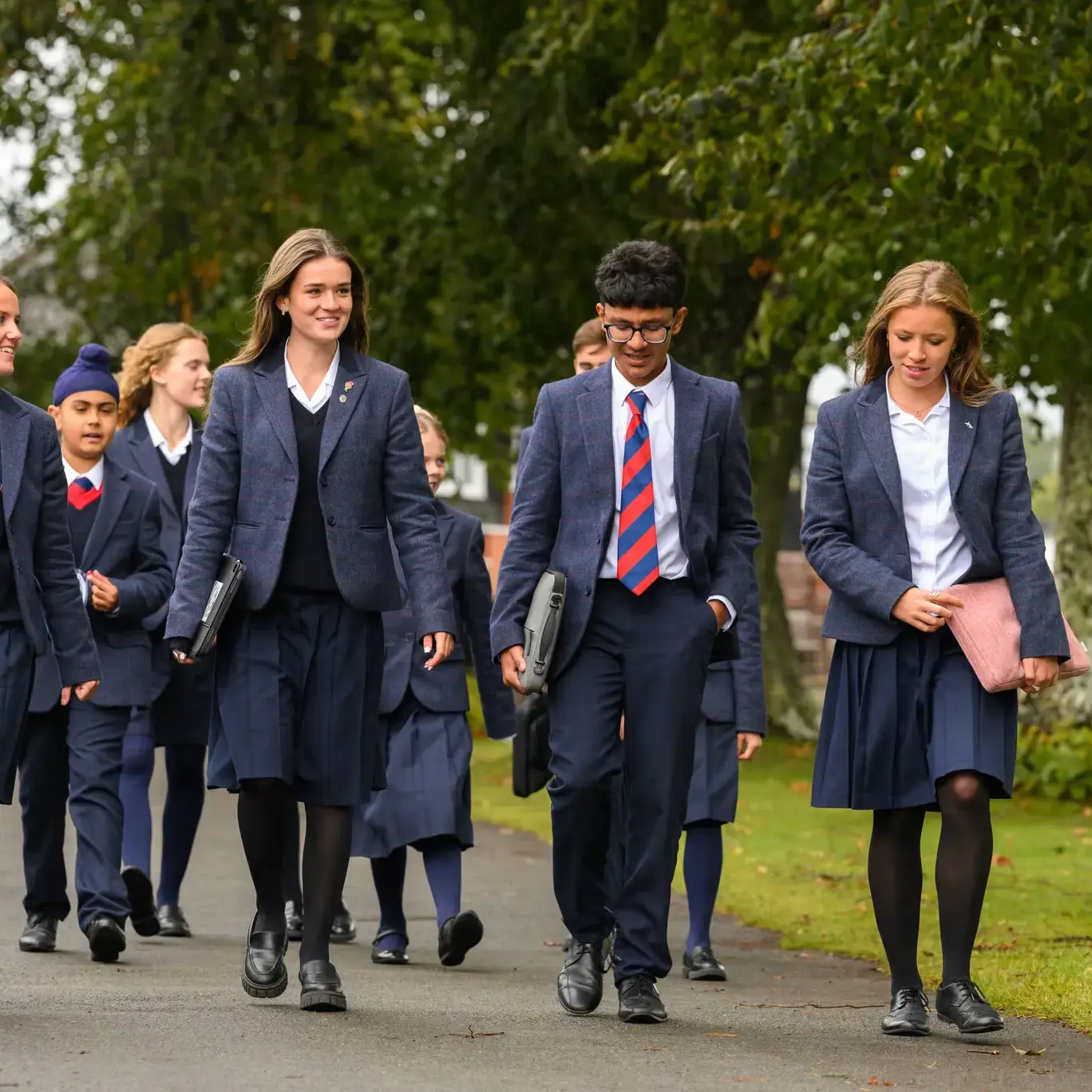 Group of students walking down path